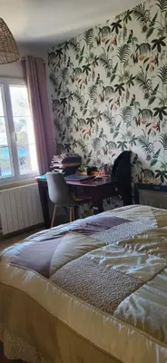 Un ou plusieurs lits dans un hébergement de l'établissement 1 chambre 2 personnes dans une maison avec jardin proche centres d'intérêt et commerces