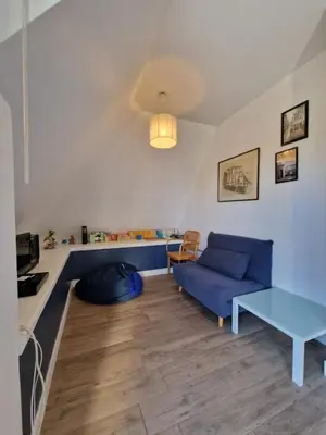 Coin salon dans l'établissement Appartement charmant bord de mer
