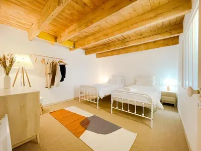 Un ou plusieurs lits dans un hébergement de l'établissement La Maison de Léon