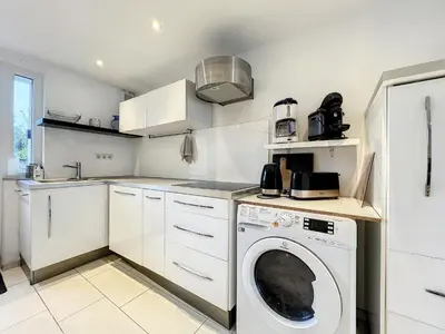 Cuisine ou kitchenette dans l'établissement La sapinière, duplex de charme