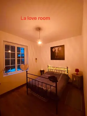 Un ou plusieurs lits dans un hébergement de l'établissement Chambre hôtes