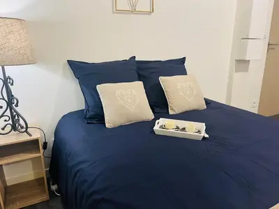 Un ou plusieurs lits dans un hébergement de l'établissement Le 2 - Grand studio Caen Centre Port de plaisance