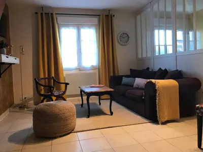 Coin salon dans l'établissement En plein coeur de Port en Bessin - Coté Port