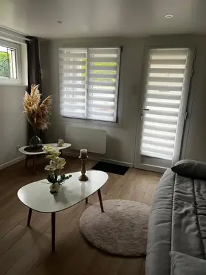 Coin salon dans l'établissement Ambiance cocooning pour visiter la Normandie