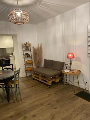 Coin salon dans l'établissement Appartement COSY