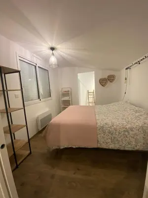 Un ou plusieurs lits dans un hébergement de l'établissement Appartement COSY