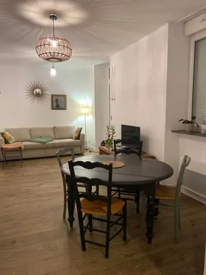 Télévision ou salle de divertissement dans l'établissement Appartement COSY