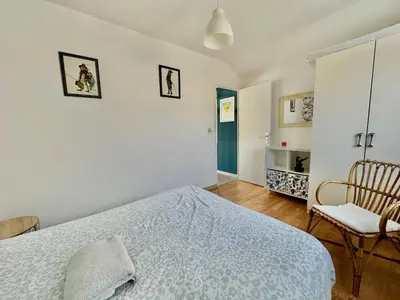 Un ou plusieurs lits dans un hébergement de l'établissement Captain's Quarters - Maison en bord de plage