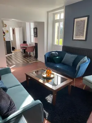 Coin salon dans l'établissement Maison au cœur d'une ancienne ferme à BAYEUX