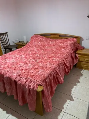 Un ou plusieurs lits dans un hébergement de l'établissement Rose des sables R d c
