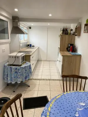 Cuisine ou kitchenette dans l'établissement Rose des sables R d c
