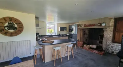 Cuisine ou kitchenette dans l'établissement Chambre Colomby Kaabi