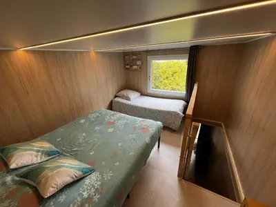 Un ou plusieurs lits dans un hébergement de l'établissement Tiny House à 10min du Mont Saint Michel