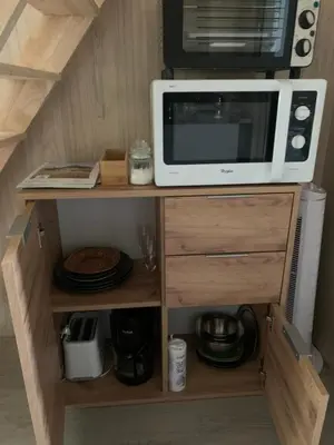 Cuisine ou kitchenette dans l'établissement Tiny House à 10min du Mont Saint Michel