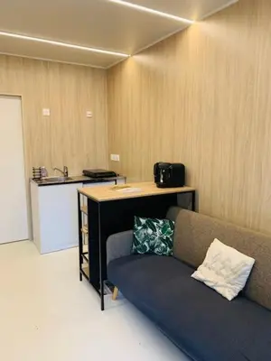 Cuisine ou kitchenette dans l'établissement Tiny House à 10min du Mont Saint Michel