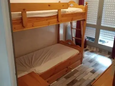 Un ou plusieurs lits dans un hébergement de l'établissement Appartement T2 - Port de Courseulles avec Parking - FR-1-746-10