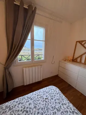 Un ou plusieurs lits dans un hébergement de l'établissement Maison port guillaume