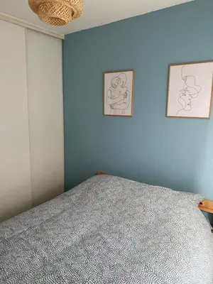 Un ou plusieurs lits dans un hébergement de l'établissement Appartement Port-En-Bessin Mer Proche