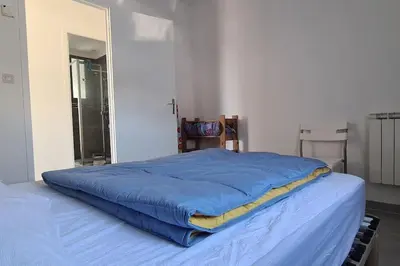Un ou plusieurs lits dans un hébergement de l'établissement Tipi des dunes