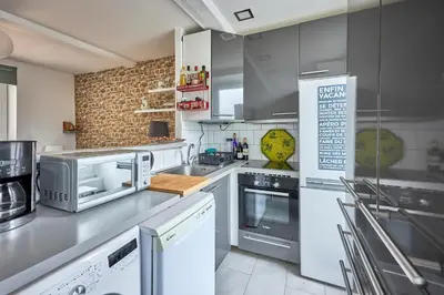 Cuisine ou kitchenette dans l'établissement Cottage Côté Mer - A 1km de la plage