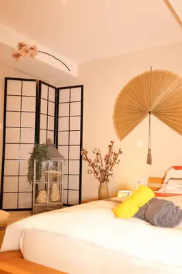 Un ou plusieurs lits dans un hébergement de l'établissement Le Jade Rouge - Love Gîte Japonais en Normandie