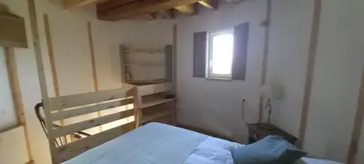 Un ou plusieurs lits dans un hébergement de l'établissement Le vieux Moulin de Pierre