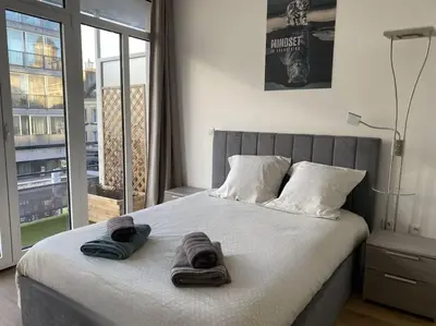 Un ou plusieurs lits dans un hébergement de l'établissement Un extérieur en ville