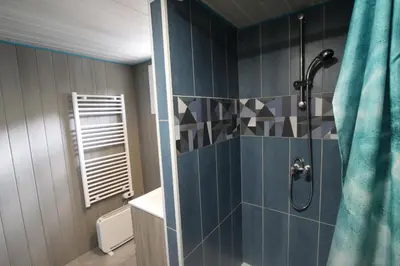 Salle de bains dans l'établissement Location Bord De Mer