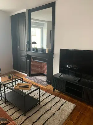 Télévision ou salle de divertissement dans l'établissement Le RIVA Cherbourg Centre