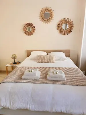 Un ou plusieurs lits dans un hébergement de l'établissement Appartement Amiral d'Aboville