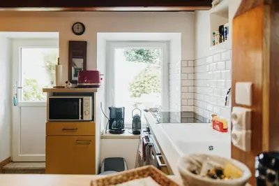 Cuisine ou kitchenette dans l'établissement La Maison du Pêcheur