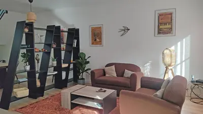 Coin salon dans l'établissement Duplex lumineux et calme en centre-ville