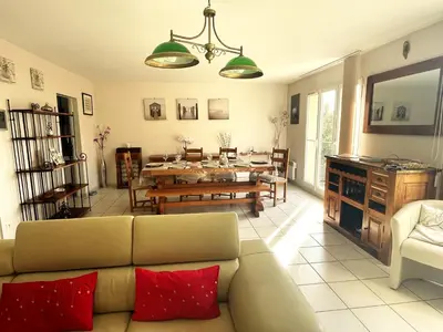 Coin salon dans l'établissement Maison calme et cosy à Port-en-Bessin près du golf et de la mer
