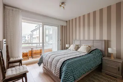 Un ou plusieurs lits dans un hébergement de l'établissement Chez Doudou - Appt pour 4