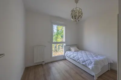 Un ou plusieurs lits dans un hébergement de l'établissement Rivage Calvados - A 500m de la plage