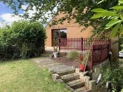 Jardin de l'établissement Le Clos des Tilleuls - D Day Home - Gîte