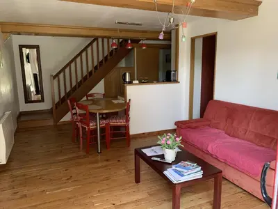 Coin salon dans l'établissement Le Clos des Tilleuls - D Day Home - Gîte