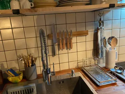 Cuisine ou kitchenette dans l'établissement la petite maison Normandie