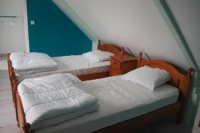 Un ou plusieurs lits dans un hébergement de l'établissement Le bois aux Ecureuils