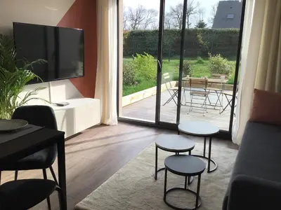 Coin salon dans l'établissement Au Coeur d'Omaha Beach - Colleville-sur-Mer - Gîte 1