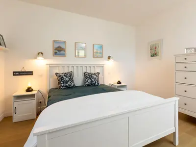 Un ou plusieurs lits dans un hébergement de l'établissement Apartment Garance by Interhome