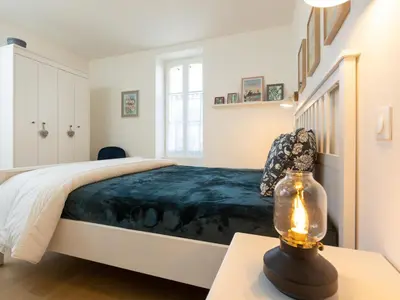 Un ou plusieurs lits dans un hébergement de l'établissement Apartment Garance by Interhome