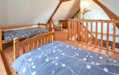 Un ou plusieurs lits dans un hébergement de l'établissement Cozy Home In St Germain Du Pert
