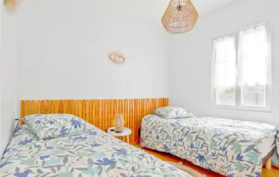 Un ou plusieurs lits dans un hébergement de l'établissement Gorgeous Home In Creances-Plage