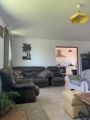 Coin salon dans l'établissement Holiday home La Ransonniere de Bas