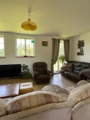 Coin salon dans l'établissement Holiday home La Ransonniere de Bas