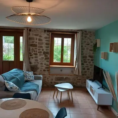Coin salon dans l'établissement gîte le petit roussel