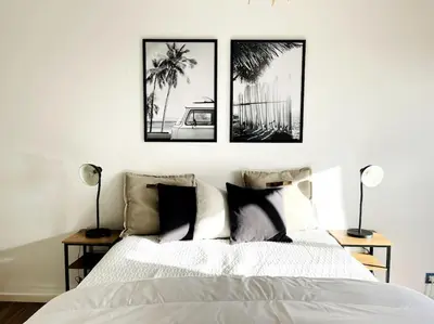 Un ou plusieurs lits dans un hébergement de l'établissement studio à deux pas de la plage et des commerces