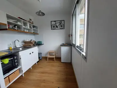 Cuisine ou kitchenette dans l'établissement Appartement calme et cosy