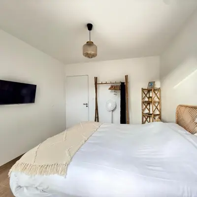 Un ou plusieurs lits dans un hébergement de l'établissement Villa Saint Mart-Plage à 500m-Tout inclus